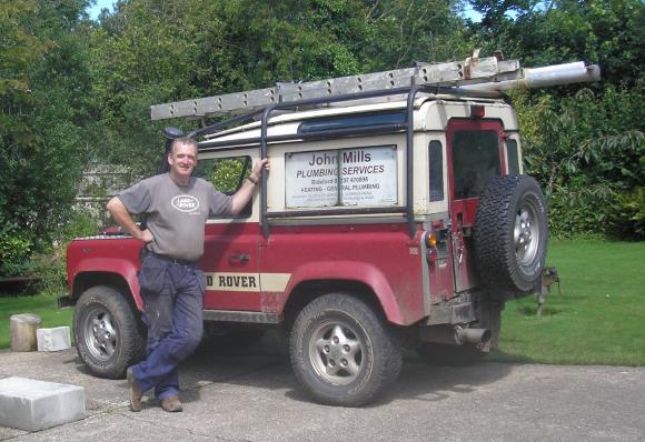 John standing by his Range Rover